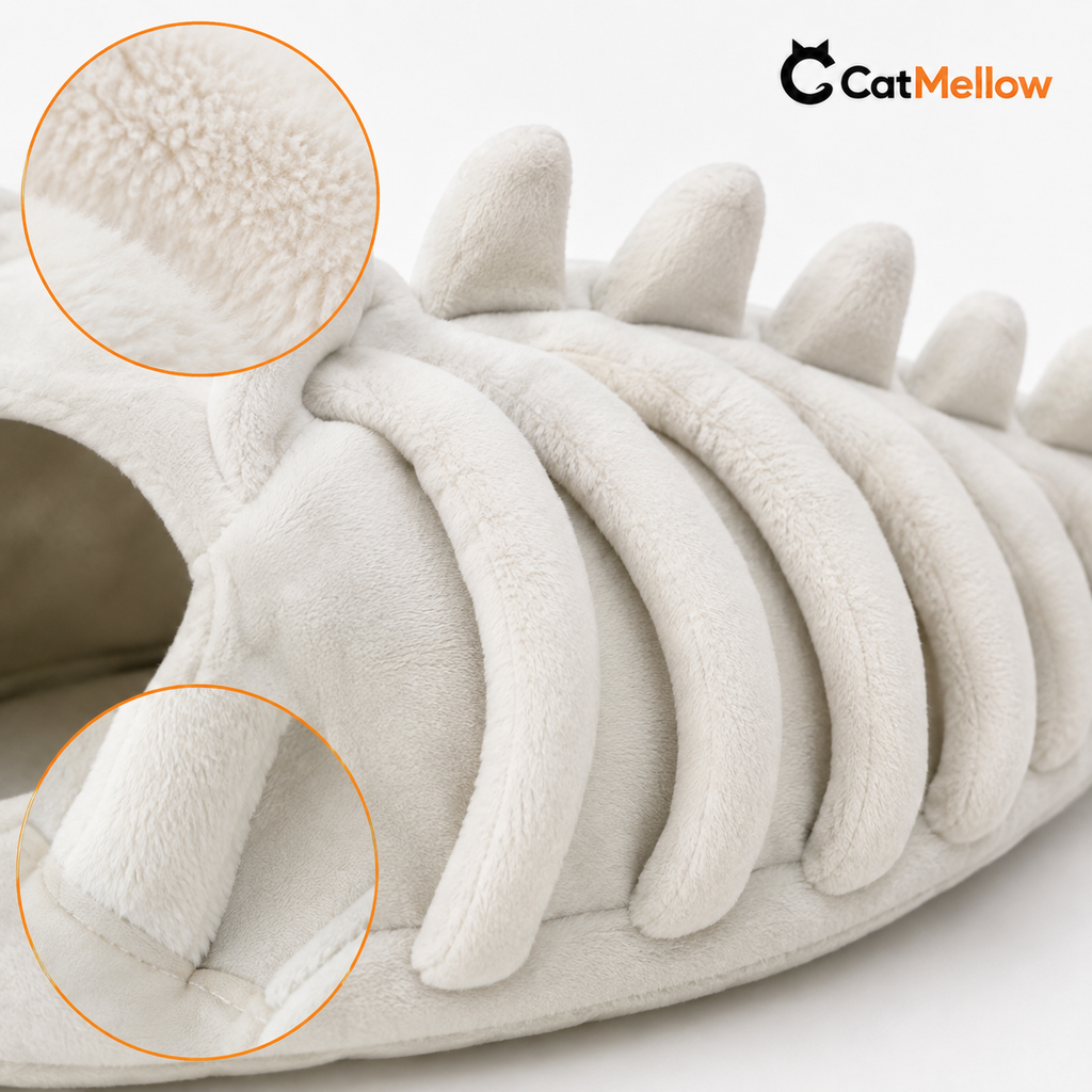 Close-up of the plush rib, spine, stitching and raised dinosaur details on the cat costume