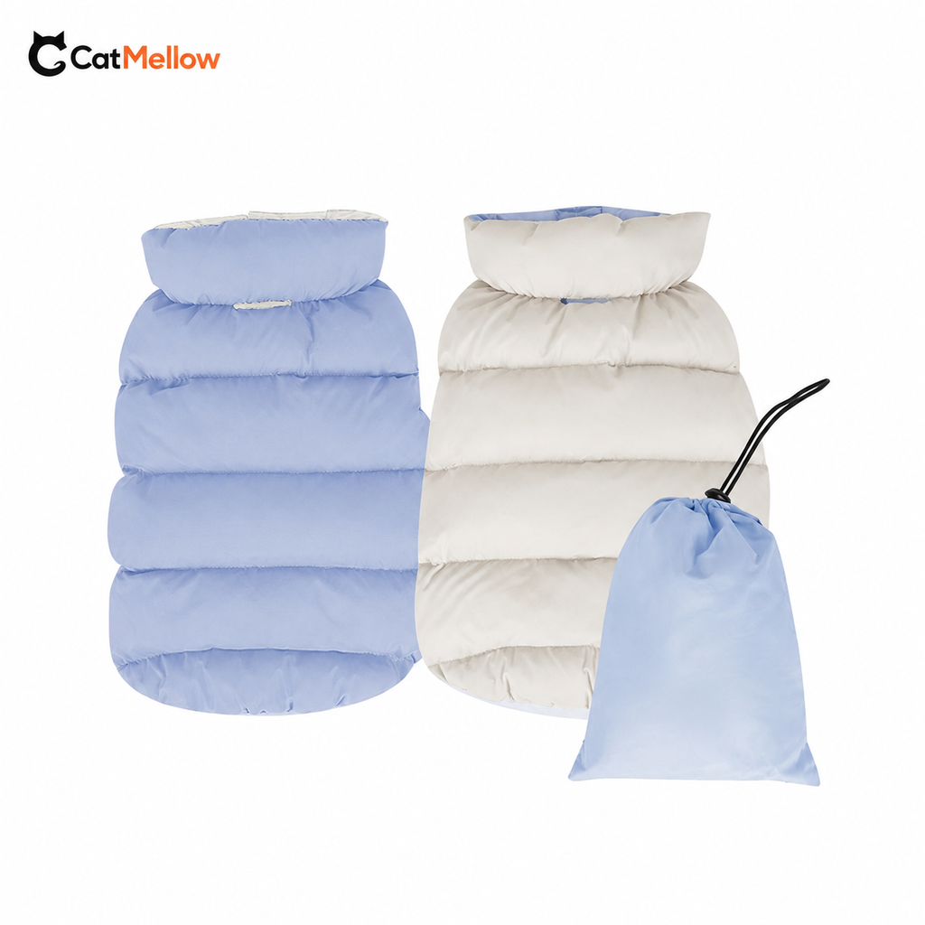 Blue and white reversible dog puffer vests with matching storage bag