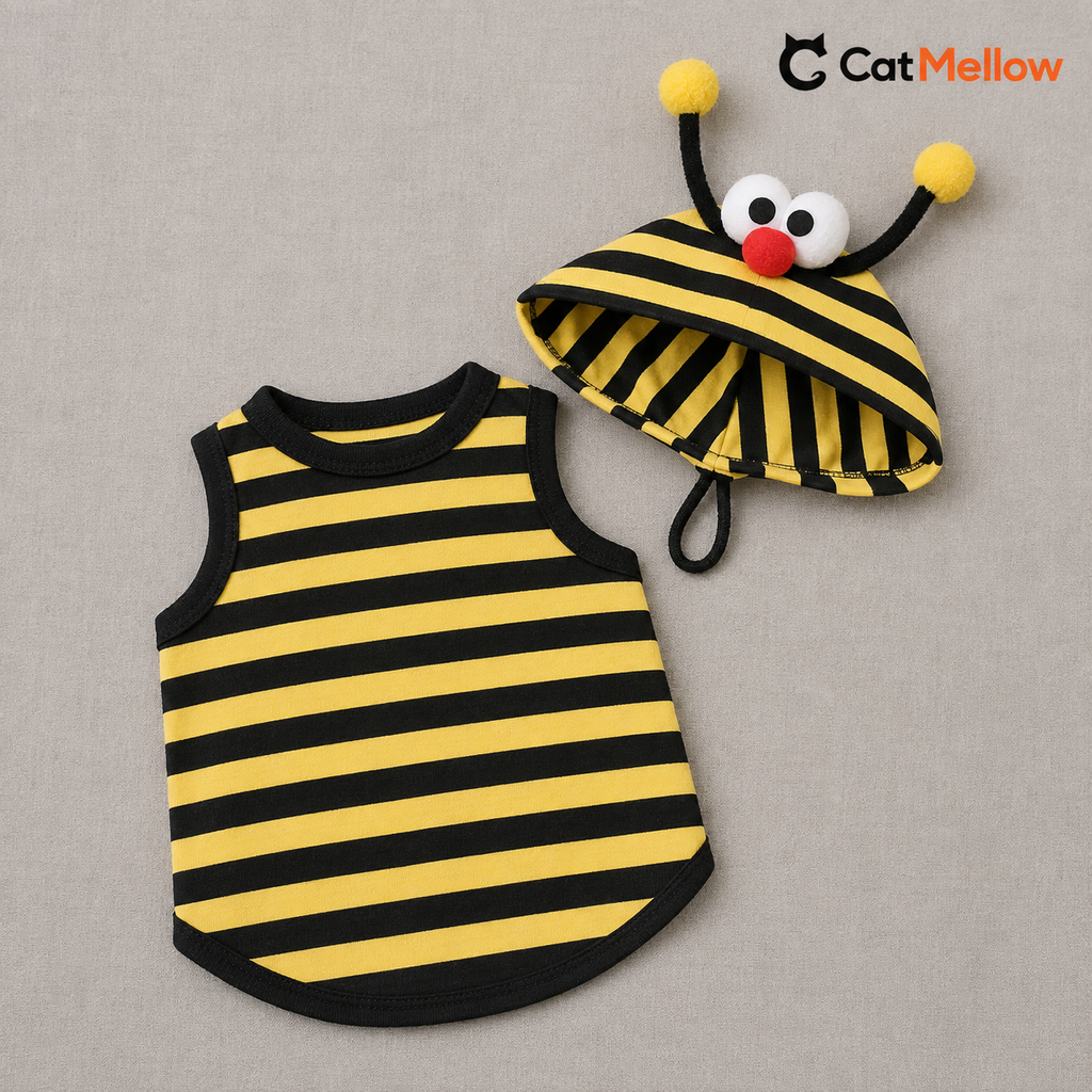 Yellow-and-black striped sleeveless cat top and matching bee hood displayed flat