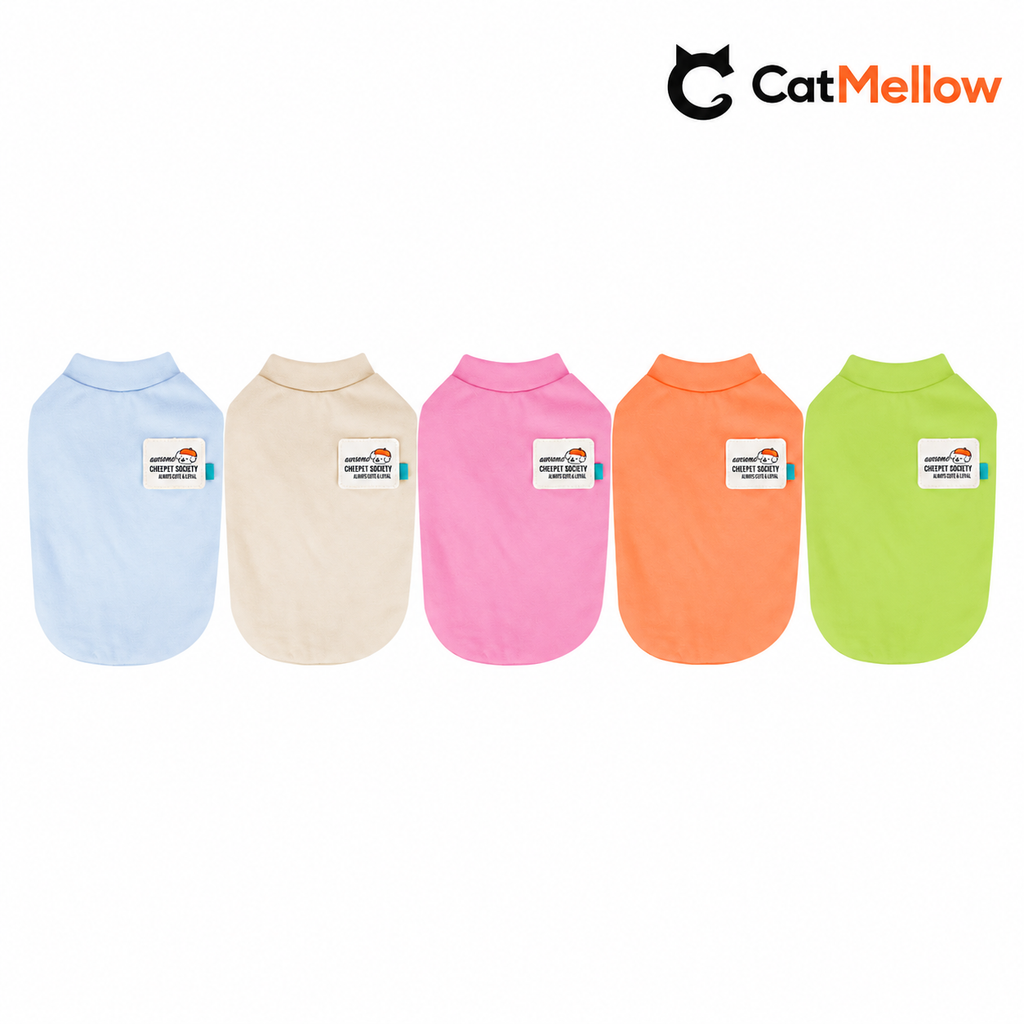 Five dog shirts in blue, cream, pink, orange, and green